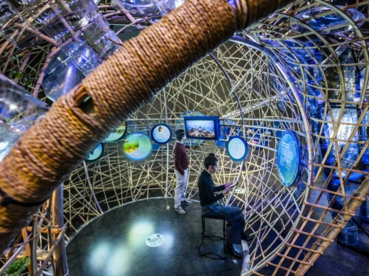 Ocean Futures Exhibition, people looking at screens within fantastic installation