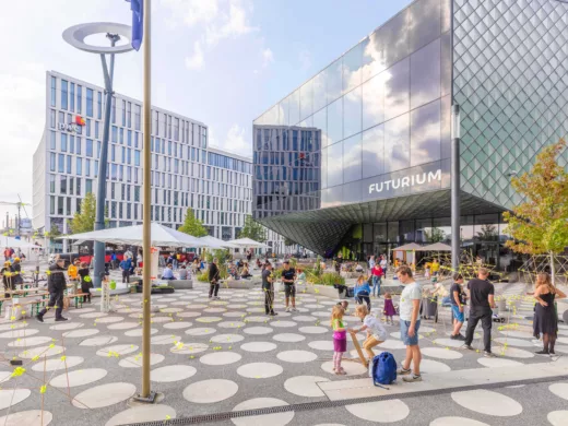 The Futurium from the outside with visitors on the forecourt