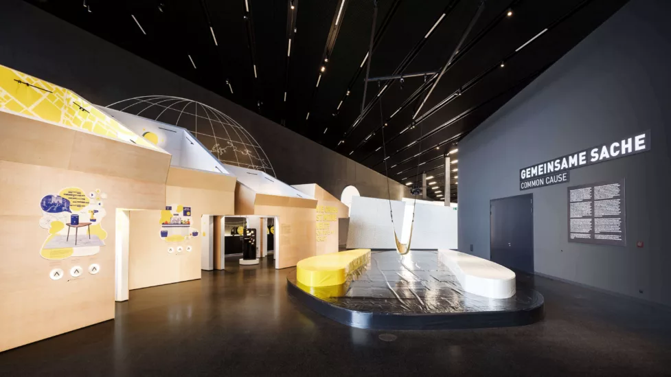 The human exhibition room with walls and a large swing